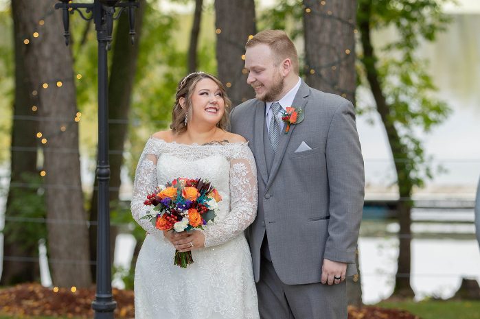 A man and woman standing next to each other.