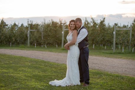A man and woman posing for a picture.
