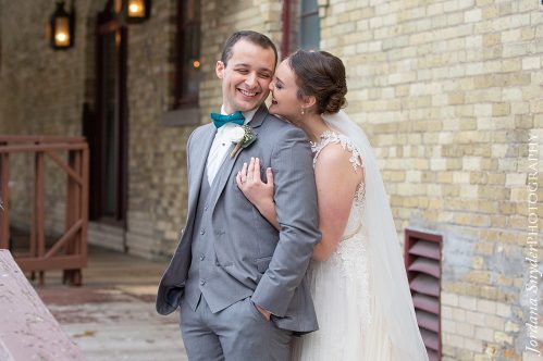 A man and woman posing for a picture.