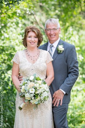 A man and woman posing for a picture.