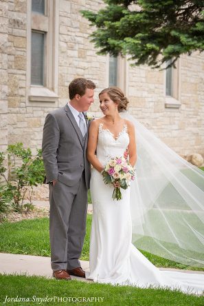 A man and woman standing next to each other.