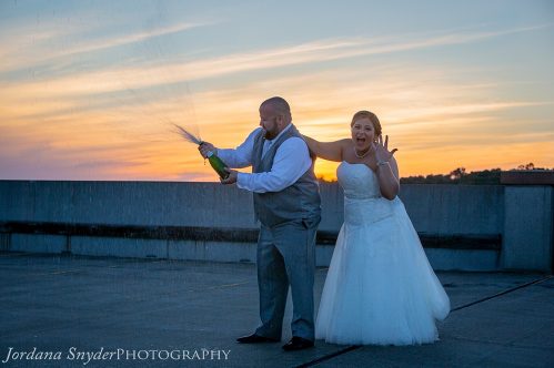 A man and woman posing for a picture.