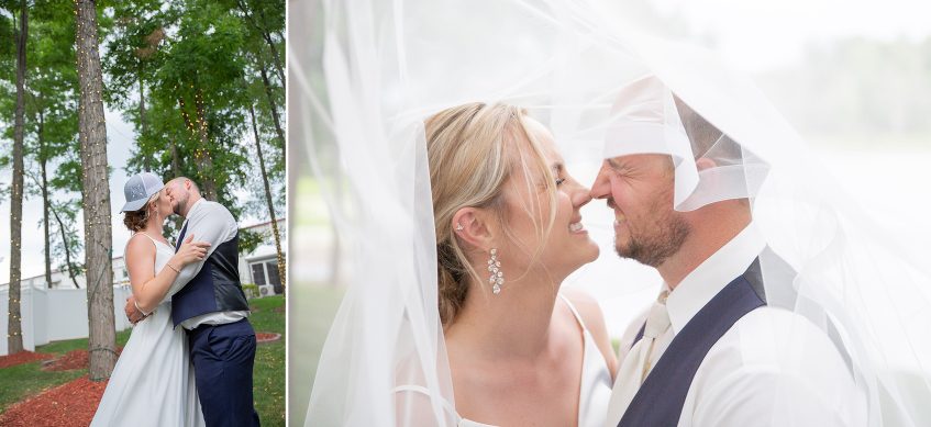 A man and woman kissing under a white canopy.