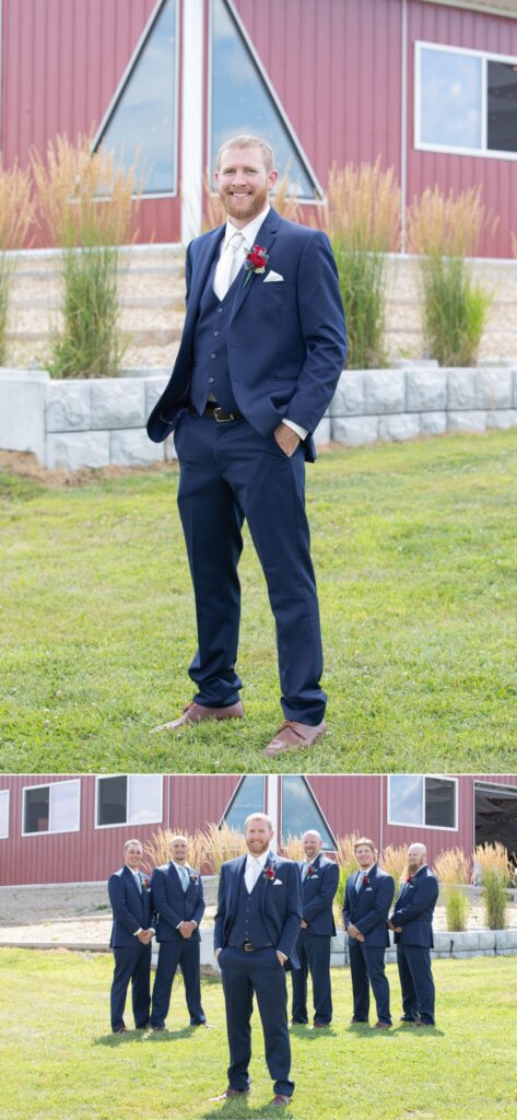 A man in a suit holding something in his hands.