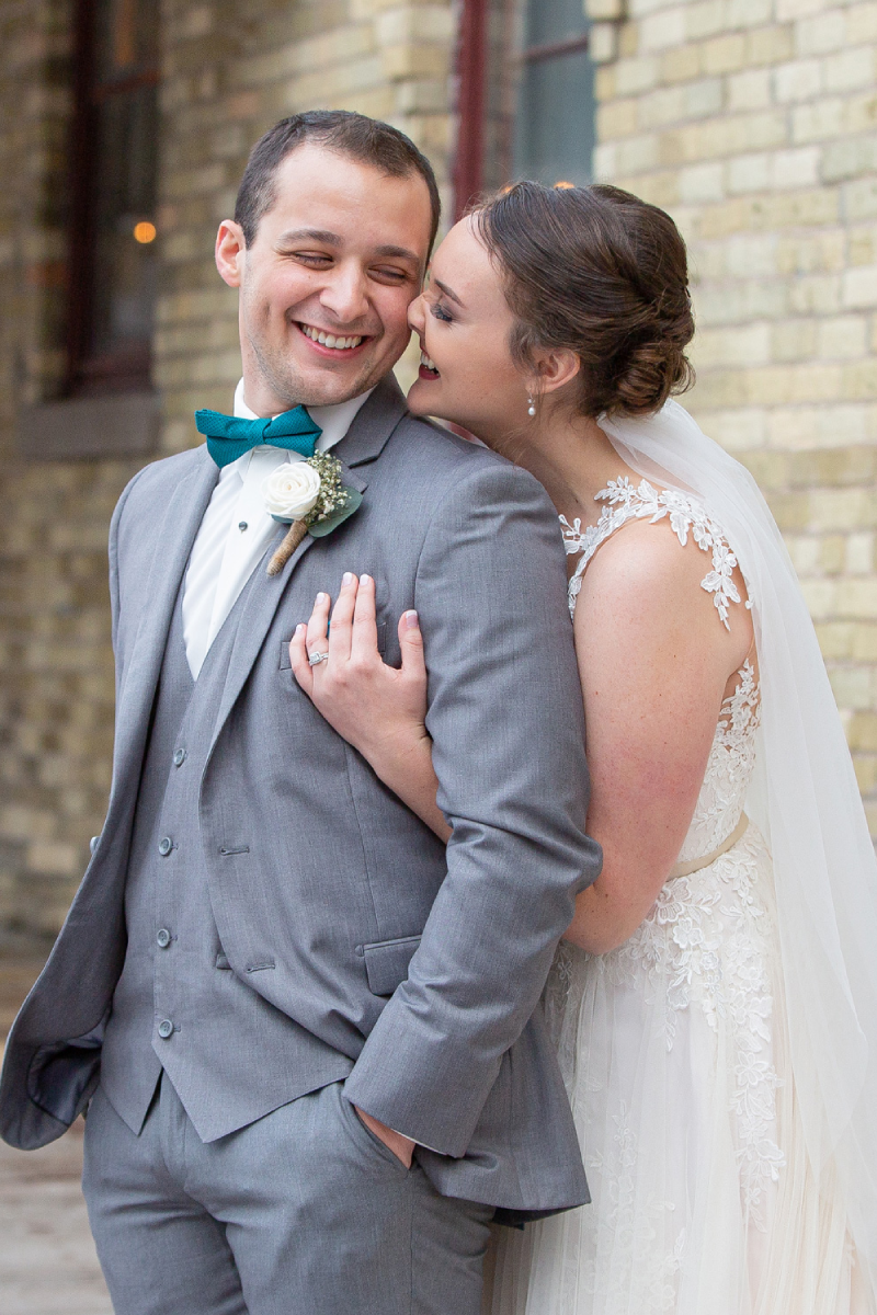 A man and woman smiling for the camera.