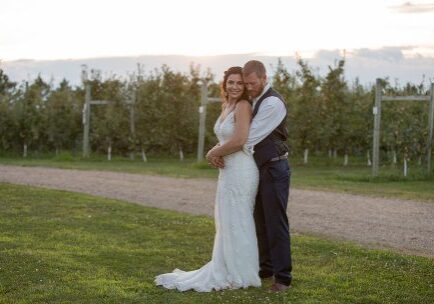 A man and woman posing for a picture.