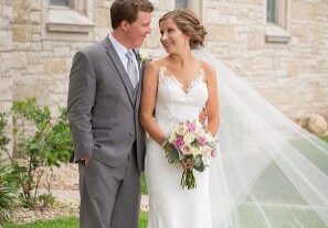 A man and woman standing next to each other.