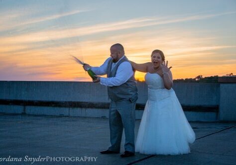 A man and woman posing for a picture.