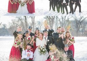 A group of people in the snow posing for a picture.
